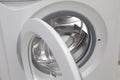 Washing machine with empty drum as background, closeup Royalty Free Stock Photo