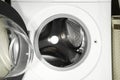 Washing machine with empty drum as background, closeup Royalty Free Stock Photo