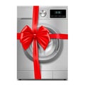 Washing machine with red ribbon and bow. 3D rendering. Gift concept. Realistic vector illustration isolated on white background Royalty Free Stock Photo