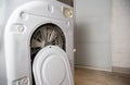Washing machine repair services. Removing the back cover for repair, industry. Copy space for text, diagnostics Royalty Free Stock Photo