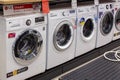 Washing machines displayed in the showroom of a commercial store. Minsk, Belarus - February, 2022 Royalty Free Stock Photo