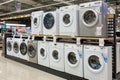 Washing machines displayed in the showroom of a commercial store. Minsk, Belarus - February, 2022 Royalty Free Stock Photo