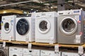 Washing machines displayed in the showroom of a commercial store. Minsk, Belarus - February, 2022 Royalty Free Stock Photo