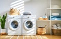 Washing machines in laundry room interior with wardrobe and accessories Royalty Free Stock Photo