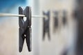 Washing. Old clothespins in rustic fiber outdoor Royalty Free Stock Photo