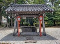 Washing pavilion, chozu-ya or temizu-ya, at Anamizuomiya shinto shrine, Japan Royalty Free Stock Photo