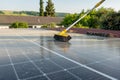 washing solar panels from dust and dirt on the roof with water close-up.Solar Panel Efficiency.Cleaning solar panels Royalty Free Stock Photo