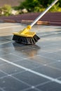 washing solar panels from dust on the roof with water close-up.Solar Panel Efficiency.Cleaning solar panels. solar power Royalty Free Stock Photo