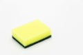 Washing sponge isolated on white background, yellow and green dishwashing sponge on white background