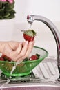 Washing strawberry Royalty Free Stock Photo