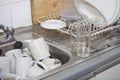 Washing-up in office kitchen sink Royalty Free Stock Photo