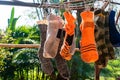 Washing the used socks and drying on the clothesline