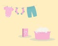 Washing: washed baby clothes cute Capri pants,socks and bodysuit hanging on clothesline and they are attached by clothespins.Wash