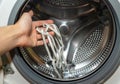 Washing white shoe laces in a washing machine Royalty Free Stock Photo