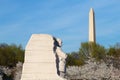 WASHINGTON DC - APRIL 12, 2015: The Martin Luther King Jr Memorial and Washington Monument during cherry blossom in Washington Royalty Free Stock Photo
