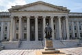 Washington, DC - August 4, 2019: Exterior of the United States Department of Treasury, with statue of Albert Gallatin, secretary Royalty Free Stock Photo