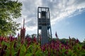 Washington, DC - August 7, 2019: Netherlands Carillon, a 127-foot tall steel tower in Arlington Ridge Park, with flowers in