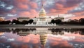 Washington DC, Capitol Building in a cloudy sunrise with mirror reflection