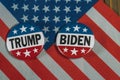 Washington DC--July 5, 2020; Round red white and blue Donald Trump and Joe Biden Presidential campaign buttons sit on an American