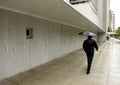 Washington, DC - June 04, 2018: Pedestrian with an umbrella near Royalty Free Stock Photo