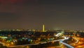 Washington DC Night photography aerial view. Washington Monument and highway I- 395 at night. Car lights trails.