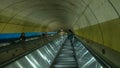 WASHINGTON, DC, USA -April, 3, 2017: riding a subway escalator at a metro station in washington dc Royalty Free Stock Photo