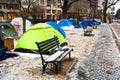 Washington, DC, USA - Feb. 14, 2020: homeless tents covered in ice in winter in the middle of the city