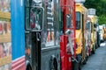 Washington DC, USA - June 9, 2019: Parked and lined up street food trucks in Washington DC. Selective focus and vintage style