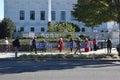 Women display a sign , Royalty Free Stock Photo