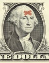 Washington dollar portrait with bandages