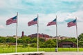 Four flags flying on Washington mall