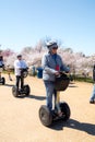 Washington Mall with tourists during the cherry blossom festival on segways