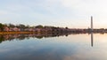 Washington Monument across Tidal Basin during cherry blossom festival. Royalty Free Stock Photo