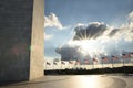 Washington Monument and american flags during sunset Royalty Free Stock Photo