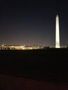 Washington Monument from a bridge at night lit up Royalty Free Stock Photo