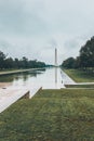 Washington Monument in Washinton D.C. at the end of the Reflection Pool on a rainy day Royalty Free Stock Photo