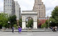 Washington Square Arch and the central fountain, at the Washington Square Park`s northern gateway, New York