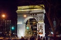 Washington Square Arch in New York City, Manhattan by Night Decorated with a Christmas Tree in Front of it. Royalty Free Stock Photo