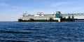 Washington State car ferry Kaleetan docked at Edmonds on a blue sea