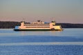 Washington State Ferry Kennewick approaching Port Townsend in last Evening Light, Puget Sound, Pacific Northwest Royalty Free Stock Photo