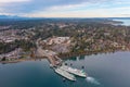 Washington State Ferry loading and unloading at the Bainbridge Island Ferry Terminal located in Eagle Harbor Royalty Free Stock Photo