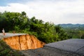 Washout: rain flood damaged badly washed out road in Thailand Royalty Free Stock Photo