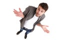 It wasnt me. High-angle shot of a young man in studio holding up his hands looking innocent.