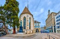 Wasserkirche church with monument to Ulrich Zwingli on Limmatquai emabankment, on April 3 in Zurich, Switzerland Royalty Free Stock Photo