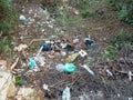 Waste abandoned in nature, a symbol of pollution and incivility