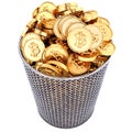 Waste basket with gold bitcoin.