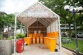 Waste bins that have been classified as garbage Set up indoors in a public park in Bangkok, Thailand.