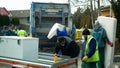 OLOMOUC, CZECH REPUBLIC, FEBRUARY 24, 2021: Waste collection large waste crushing rubbish truck machine mattress wood Royalty Free Stock Photo