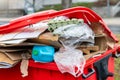 Waste container full of paper and plastic Royalty Free Stock Photo