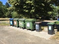 Waste containers for recyclables, organics and paper